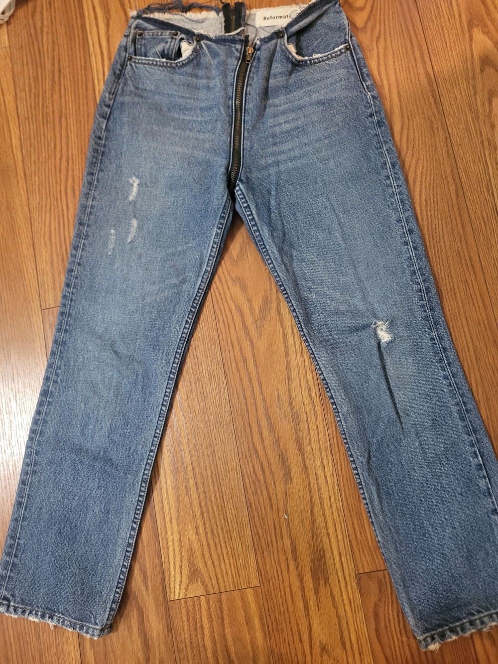 Reformation Men’s Distressed Blue Jeans